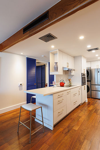 image of Honolulu condo that received home makeover with flooring and countertops from Pacific American Lumber.